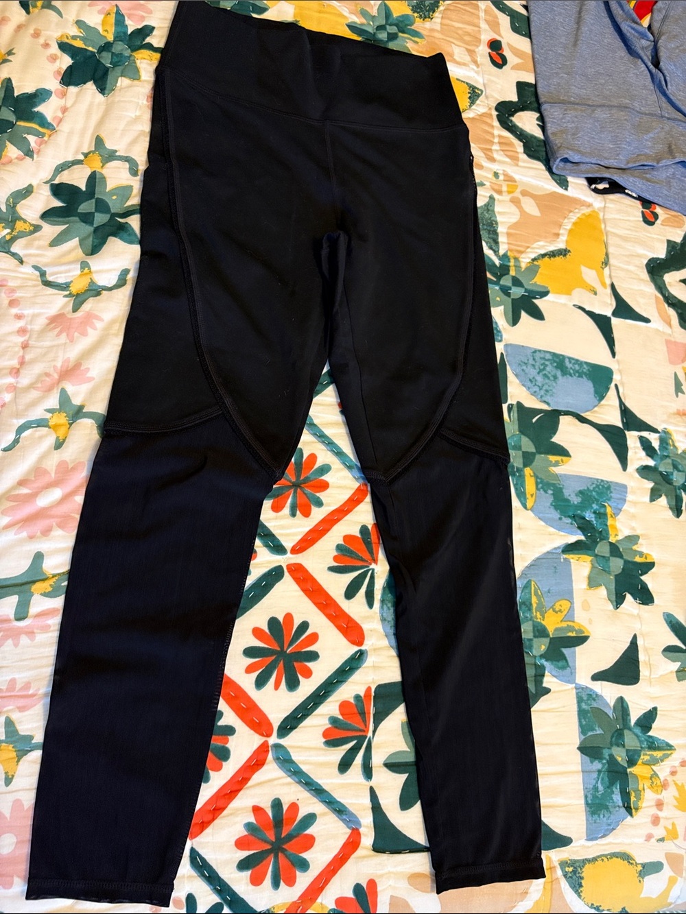 Black High-Waist Athletic Leggings with mesh below knee.